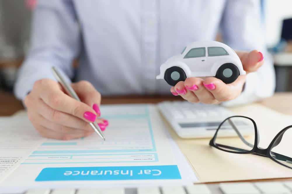 Client of insurance company takes out insurance for car. Accident insurance and disbursements after accidents concept
